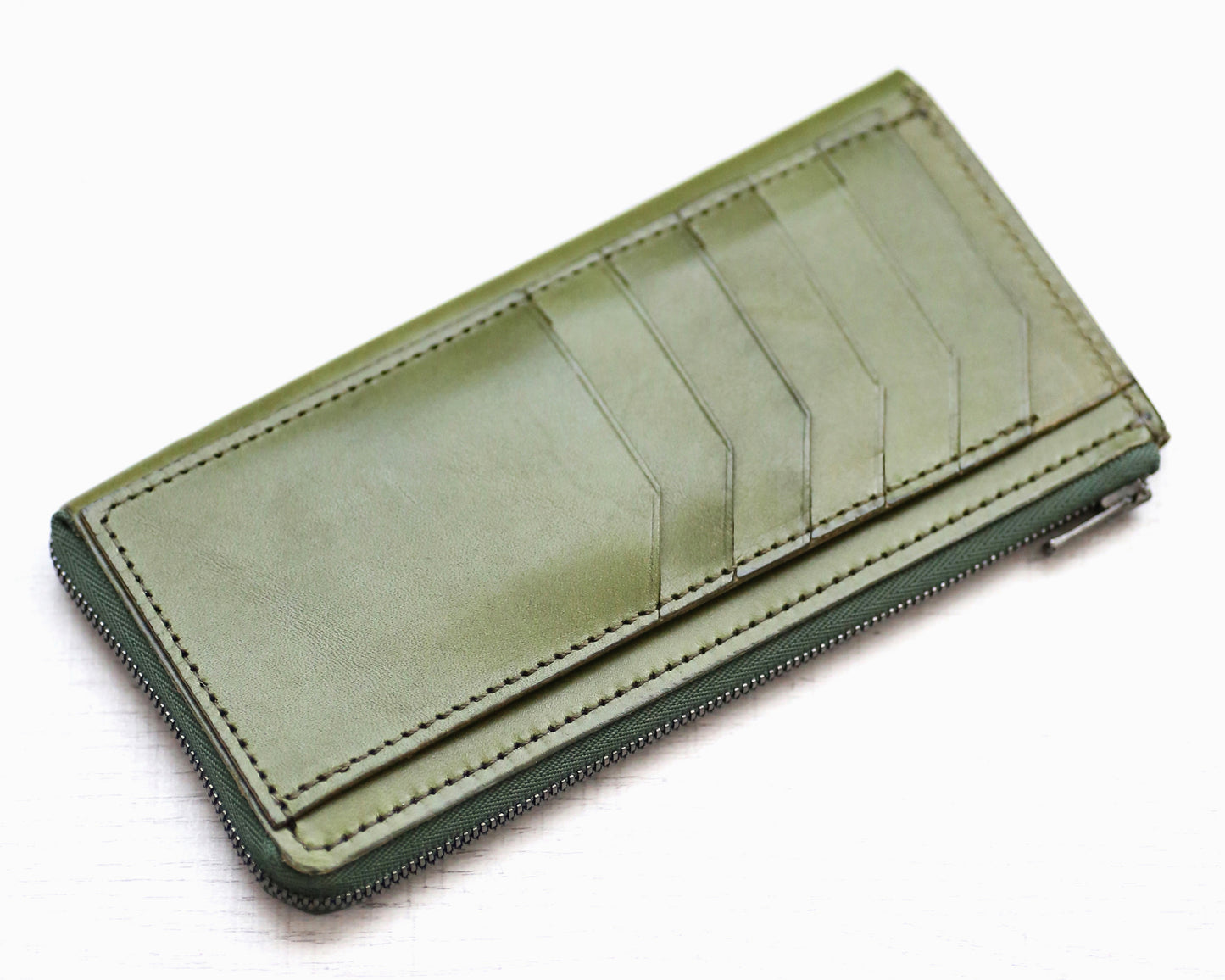 「極小Lファスナー長財布」紙幣を折らずに50枚収納!日本製長財布「FRAGMANzip」