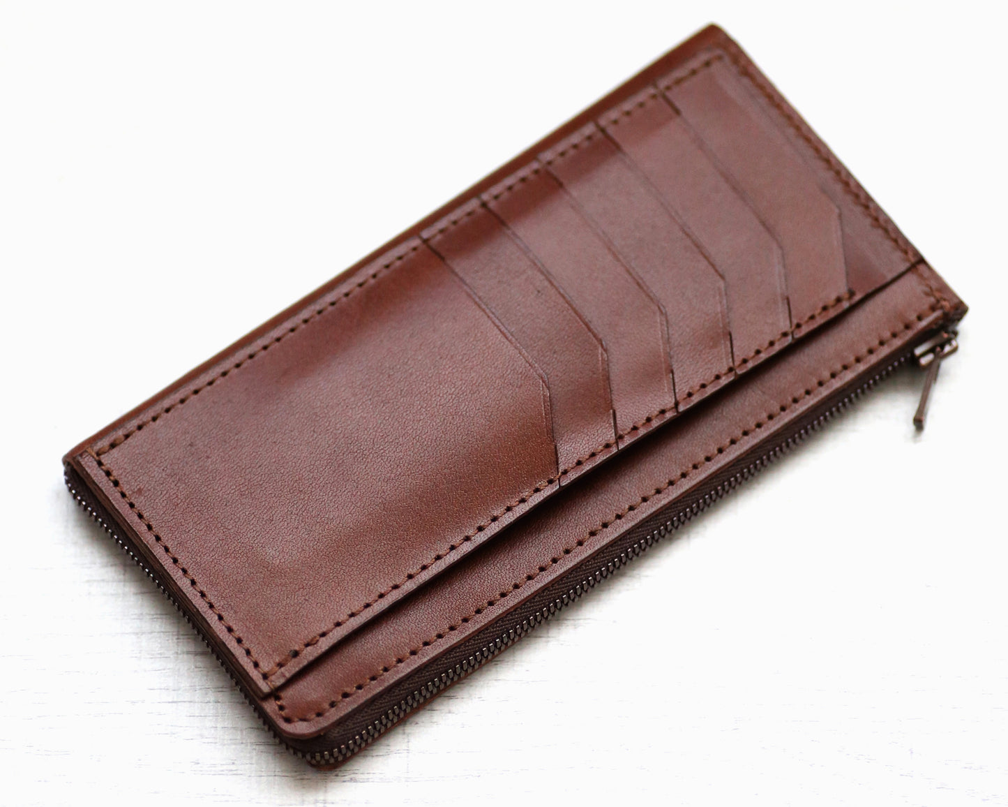 「極小Lファスナー長財布」紙幣を折らずに50枚収納!日本製長財布「FRAGMANzip」