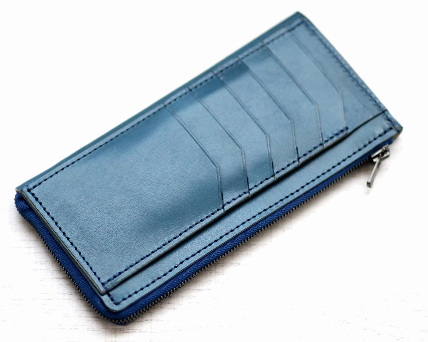 「極小Lファスナー長財布」紙幣を折らずに50枚収納!日本製長財布「FRAGMANzip」